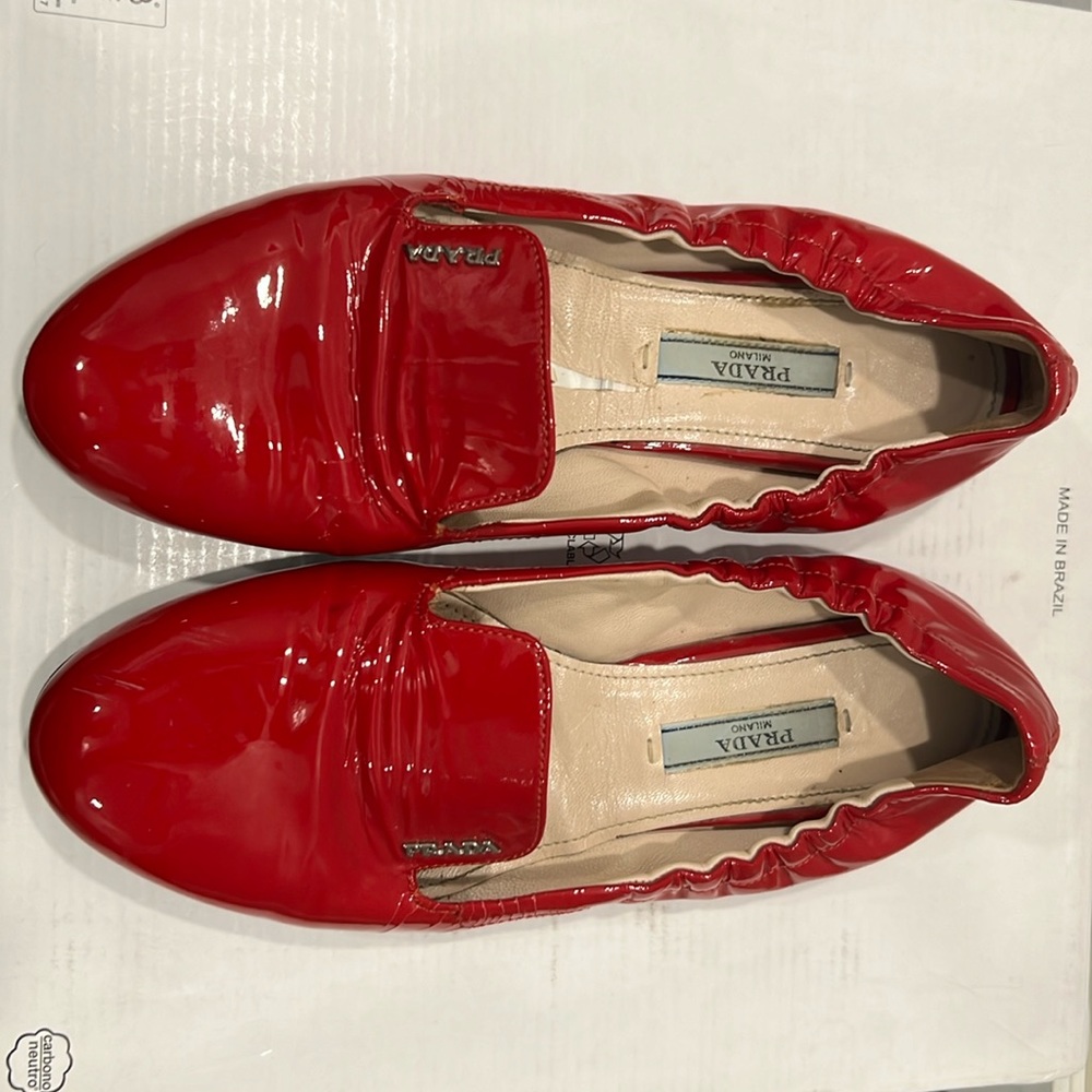 Prada red patent flats